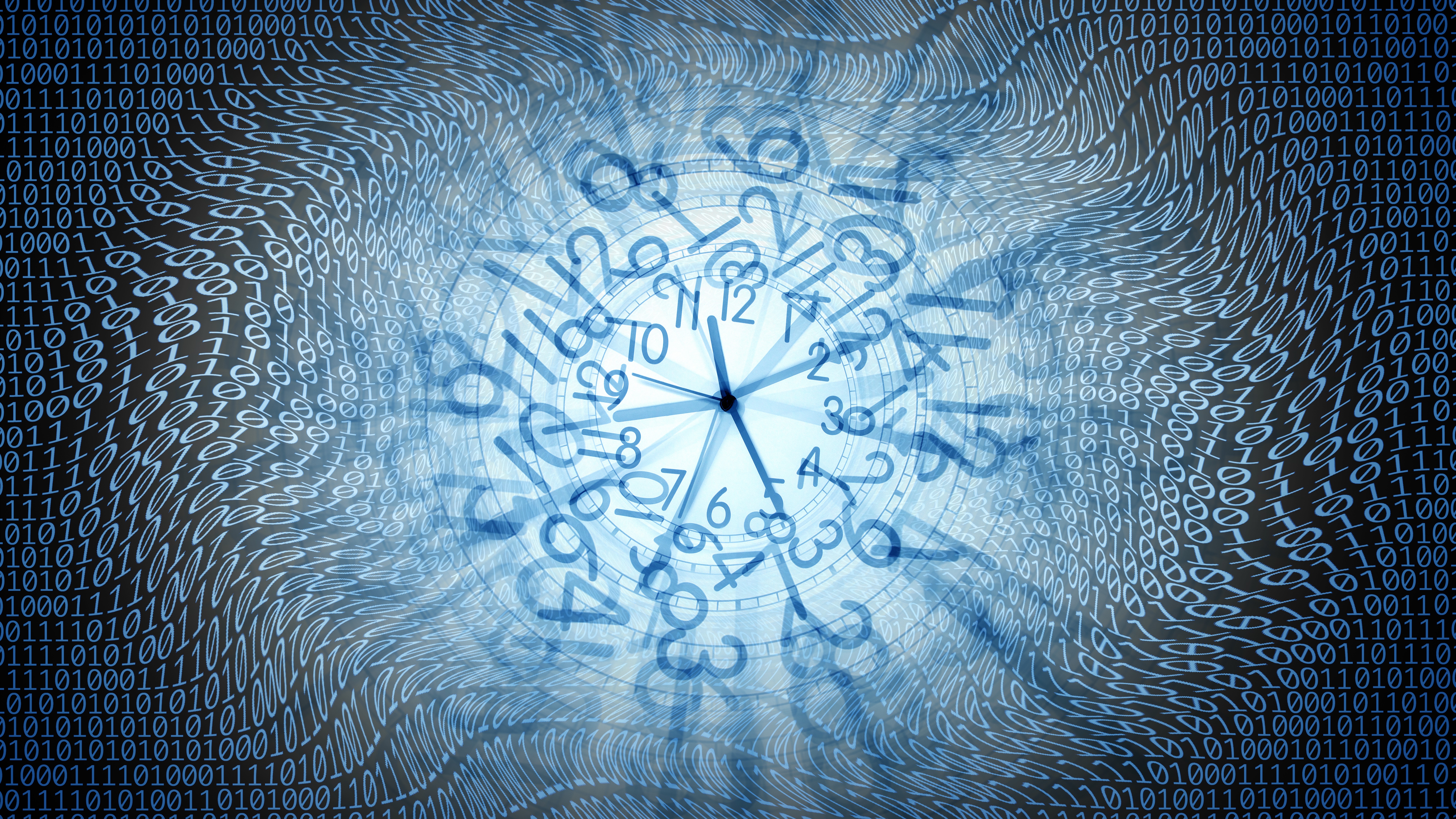 A clock appears from a sea of code.