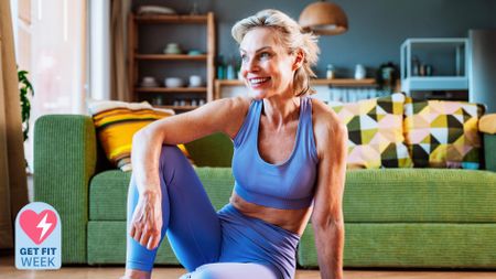 a senior woman sat on an exercise mat