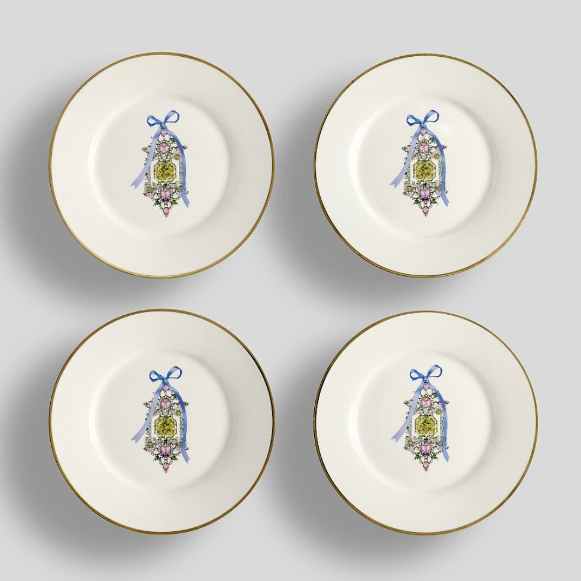 Set of four side plates with jewel designs on