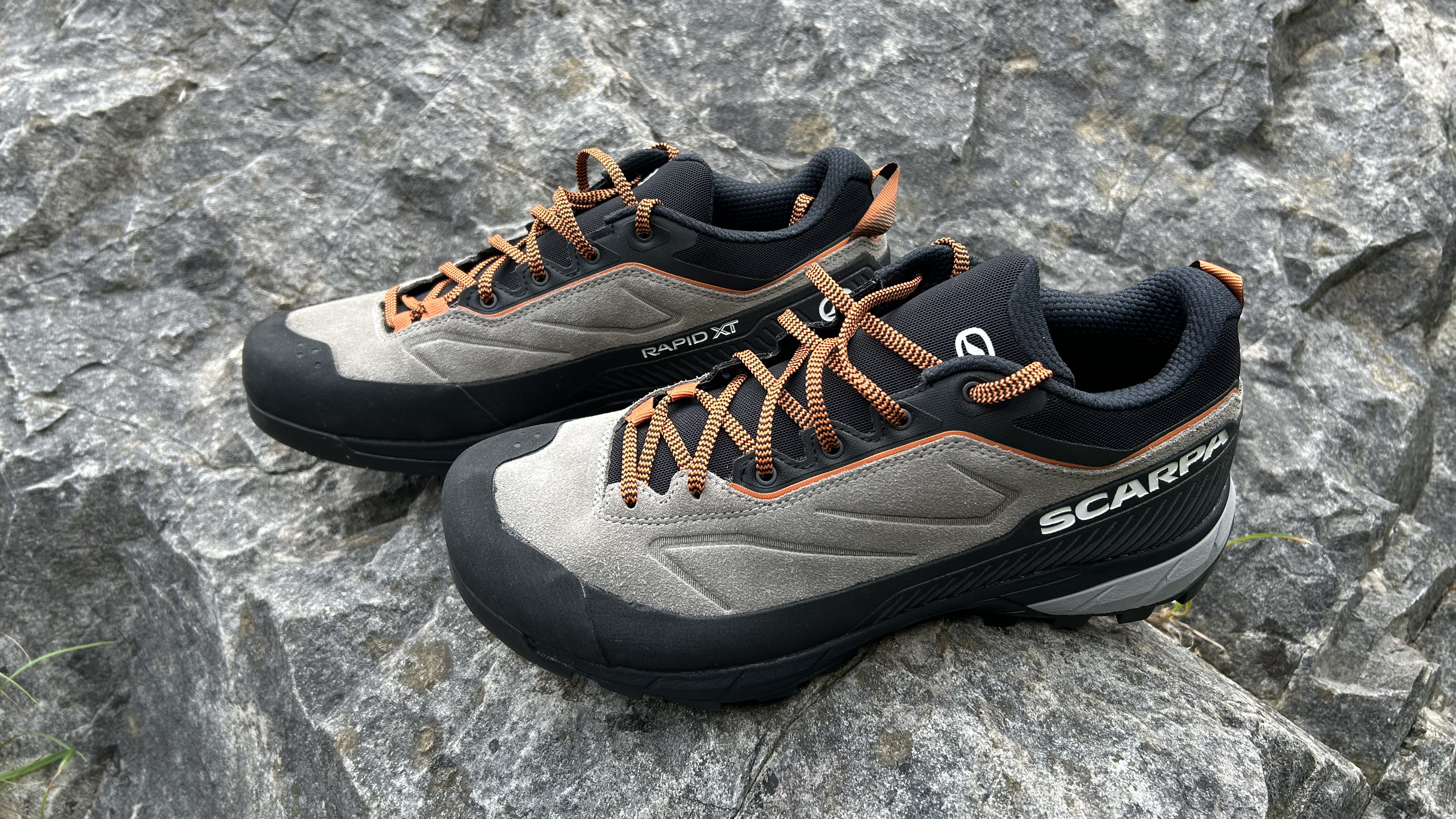 Scarpa Rapid XT approach shoes on a rock