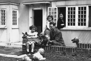 Happier days: the future George VI and family at the Welsh House in 1936