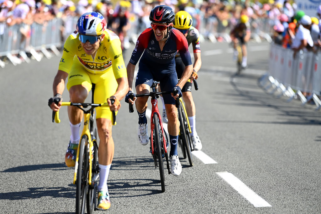 Wout van Aert in yellow jersey, Adam Yates, Tour de France 2022
