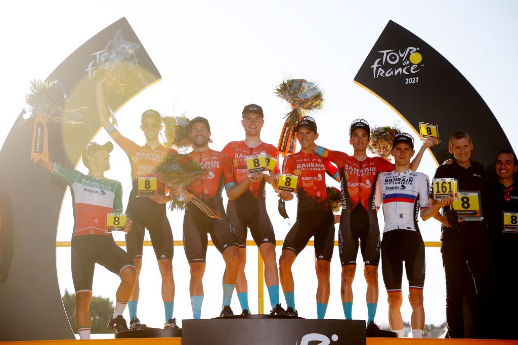 PARIS FRANCE JULY 18 Pello Bilbao of Spain Sonny Colbrelli of Italy Dylan Teuns of Belgium Wout Poels of The Netherlands Matej Mohori of Slovenia Polka Dot Mountain Jersey Marco Haller of Austria Fred Wright of The United Kingdom and Team Bahrain Victorious celebrate at podium Best Team Trophy during the 108th Tour de France 2021 Stage 21 a 1084km stage from Chatou to Paris Champslyses LeTour TDF2021 on July 18 2021 in Paris France Photo by Chris GraythenGetty Images