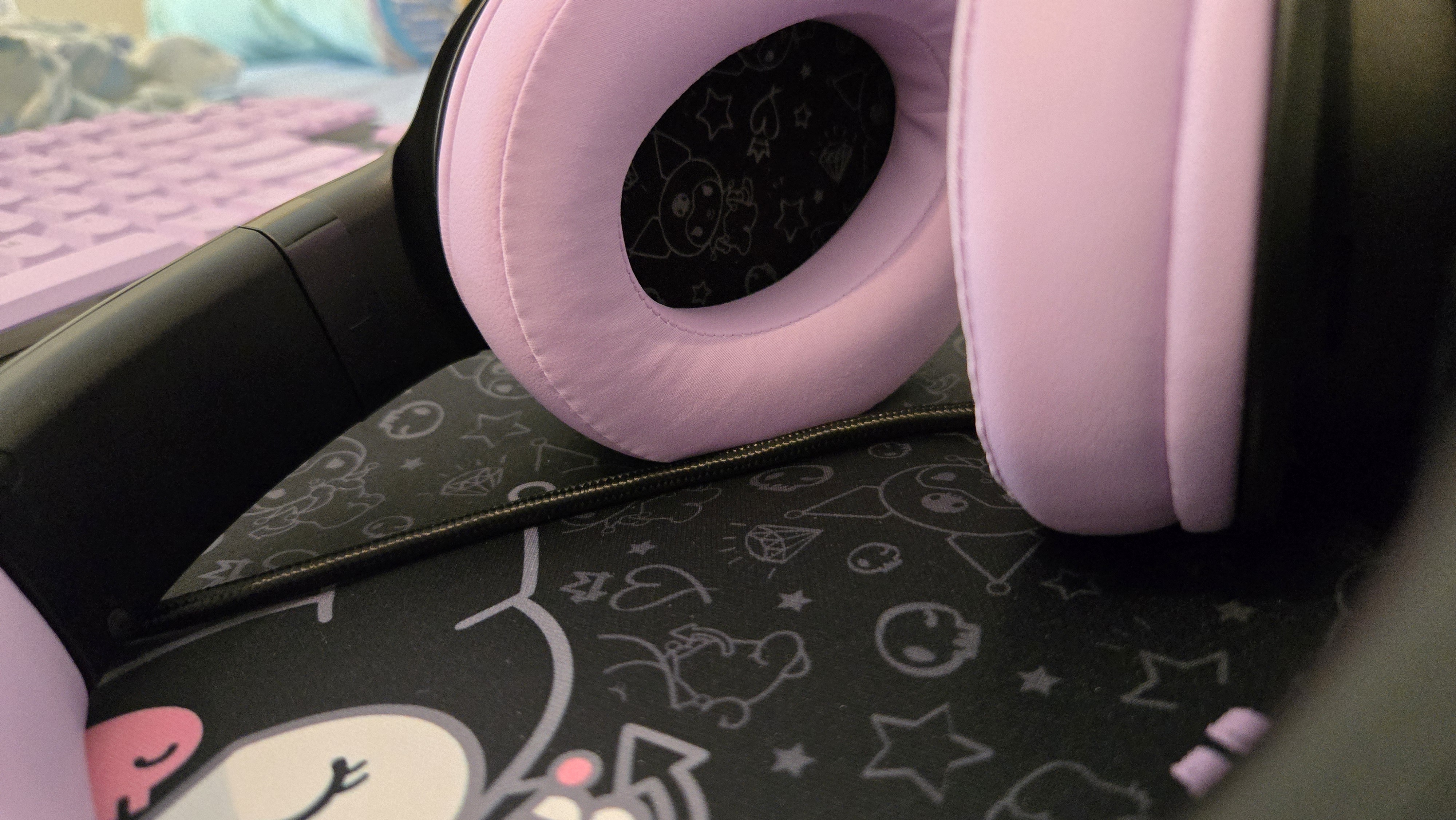 Razer | Kuromi collection peripherals laid out on a desk.