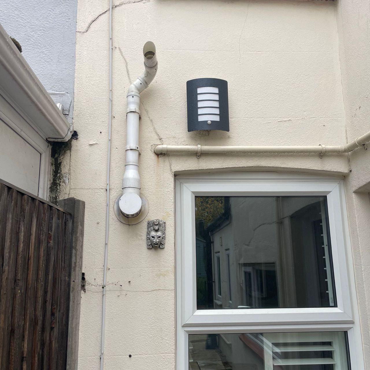 Boiler flue coming out of terraced house