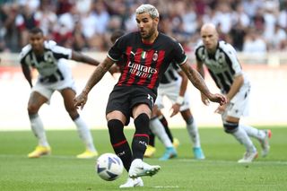 Theo Hernandez of AC Milan scores their sides first goal from the penalty spot during the Serie A match between AC MIlan and Udinese Calcio at Stadio Giuseppe Meazza on August 13, 2022 in Milan, Italy.