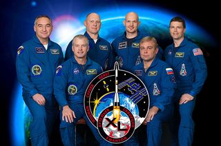 Official NASA portrait of the International Space Station’s Expedition 40 crew. Left to right: Alexander Skvortsov, Steven Swanson, Oleg Artemyev, Alexander Gerst, Maxim Suraev and Reid Wiseman.