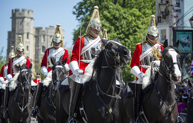 Around 250 members of the Armed forces took part in celebrations in Windsor today for the Royal Wedding of HRH Prince Henry of Wales and Ms Meghan Markle. The Royal Navy, British Army and Royal Air Force are all providing ceremonial support to mark the occasion. Units that hold a special relationship with Prince Harry were chosen at the request of Kensington Palace. Some of the troops performing ceremonial duties today served alongside Prince Harry during his ten years in the Army. From 9.30am this morning, the Band of the Irish Guards entertained crowds as they gathered to watch events unfold around Windsor. The State Trumpeters of the Band of the Household Cavalry played fanfares in St George&amp;rsquo;s Chapel to mark the arrival of HM The Queen and Ms Meghan Markle ahead of the wedding service. Members of the Household Cavalry lined the steps of St George&amp;rsquo;s Chapel as the guests leave the wedding service. After the service, a travelling Escort of the Household Cavalry Mounted Regiment accompany the bride and groom during the carriage procession through Windsor. The streets inside Windsor Castle were lined by servicemen and women from Royal Navy Small Ships and Diving, 30 Commando IX Group the Royal Marines, The 1st Battalion Irish Guards, 3 Regiment Army Air Corps, 1st Battalion The Royal Gurkha Rifles, and personnel from RAF Honington. Prince Harry joined the Army in 2005 and was commissioned as an Officer in 2006 after training at the Royal Military Academy Sandhurst. He joined The Blues and Royals, one of two regiments in the Household Cavalry, in April 2006. Prince Harry served in the Army for ten years, undertaking two tours of Afghanistan and rising to the rank of Captain. Both Prince Harry and Ms. Meghan Markle have shown their continued support for serving Armed Forces personnel and veterans in their benevolent work, most recently in their support of the Invictus Games Foundation. Sgt Donald C Todd RLC