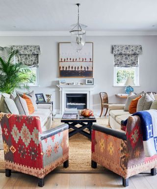 Retro living room with brightly patterned accent chairs