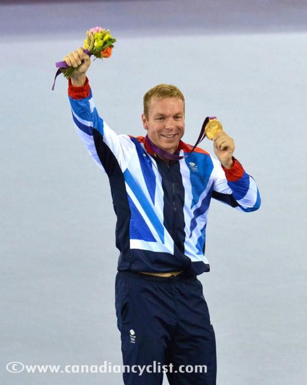 Chris Hoy shows off his gold medal