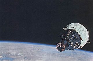 In December 1965, two Gemini spacecraft flew above the Earth at the same time. Gemini VI carried Walter M. Schirra, Jr. and Thomas P. Stafford, while Gemini Vll contained Frank Borman and James A. Lovell, Jr. This photo of Gemini VII was taken from Gemini