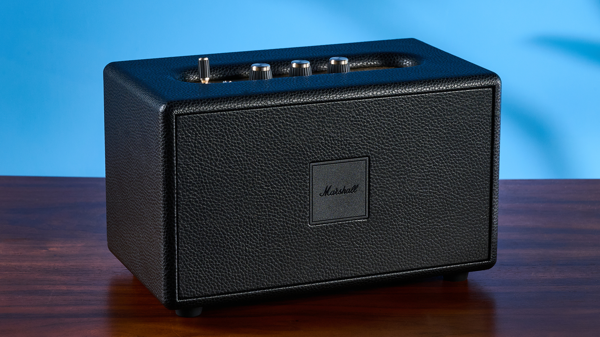 A black Marshall Acton IV mains-powered home speaker