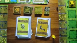 Photographs of the Agricola board game in play