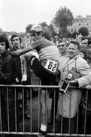 Luis Ocana climbs over the security barrier in the midst of the supporters upon his arrival in Pau during the 7th stage of the Tour de France on July 9 1972 Photo by AFP Photo by AFP via Getty Images