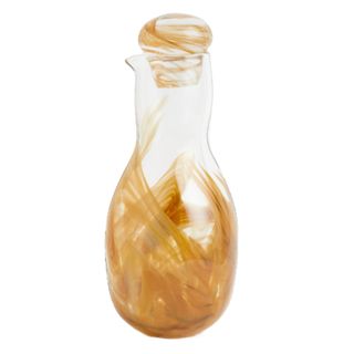 glass and mustard yellow detail oil bottle