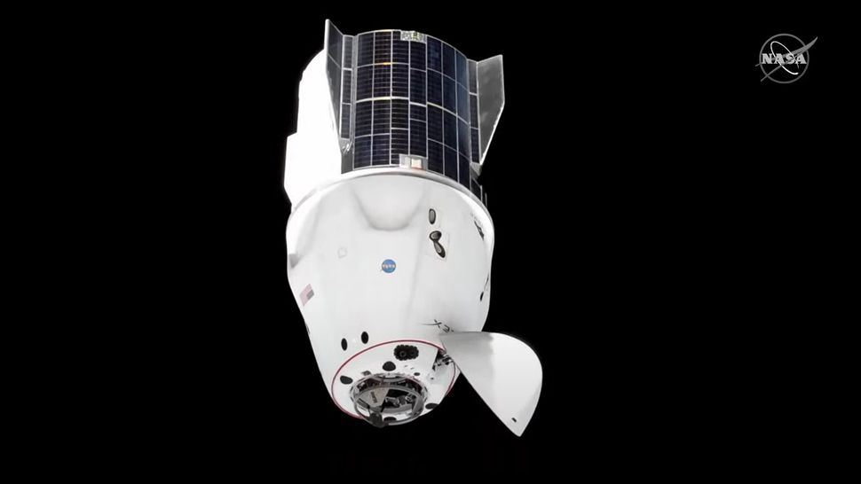 Astronauts move their SpaceX Dragon spaceship in orbit ahead of Boeing's Starliner launch