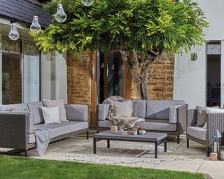 rattan garden sofa set on a patio