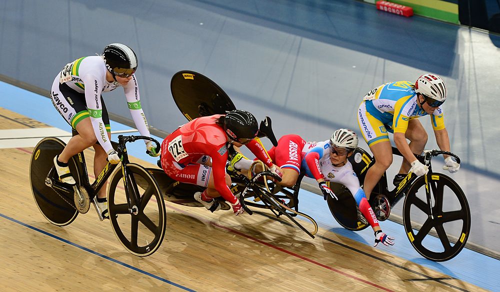 Sze Wai Lee of Hong Kong (2nd L) and Anastasiia Voinova of Russia (2nd R) crash while racing in the Women's Keirin during Day Two of the UCI Track Cycling World Championships