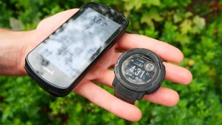 Garmin GPS computer and a Garmin smartwatch