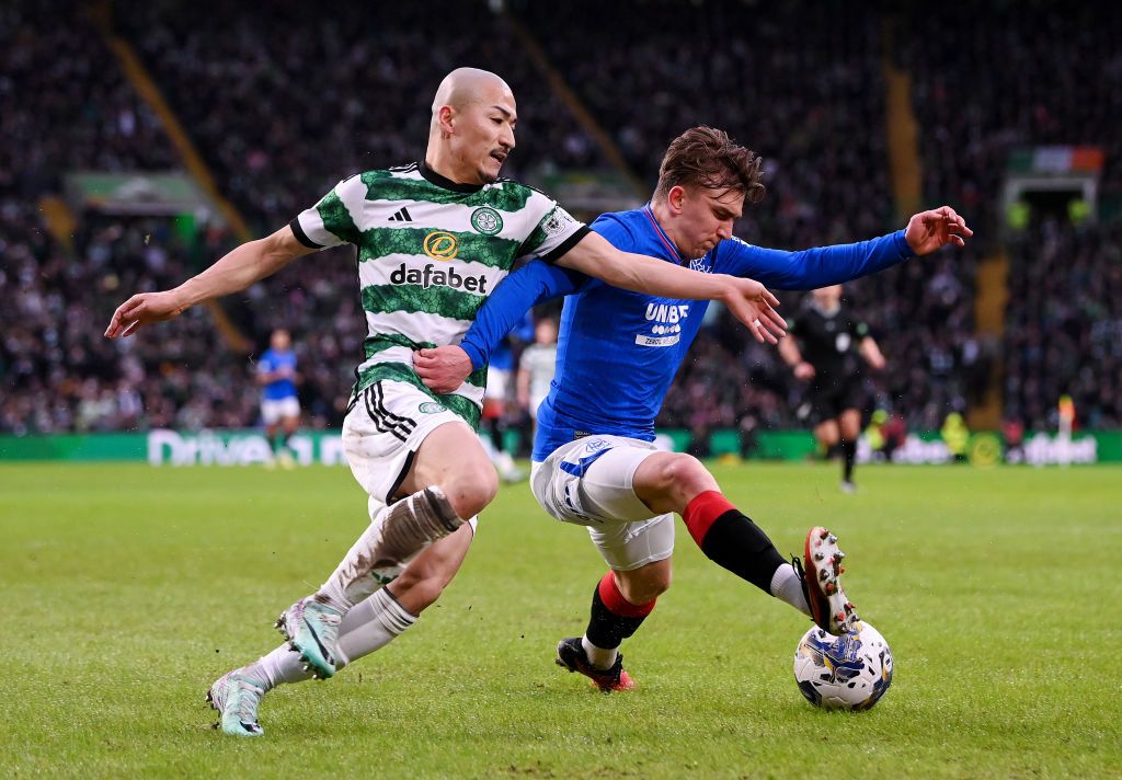 Ridvan Yilmaz of Rangers and Celtic&#039;s Daizen Maeda battle for the ball in an Old Firm match 