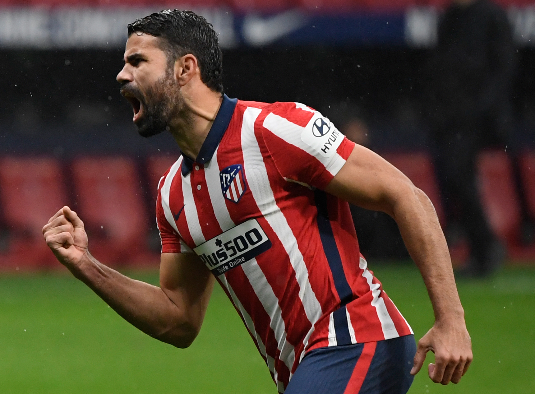 Diego Costa celebrates a goal for Atletico Madrid against Elche in December 2020.