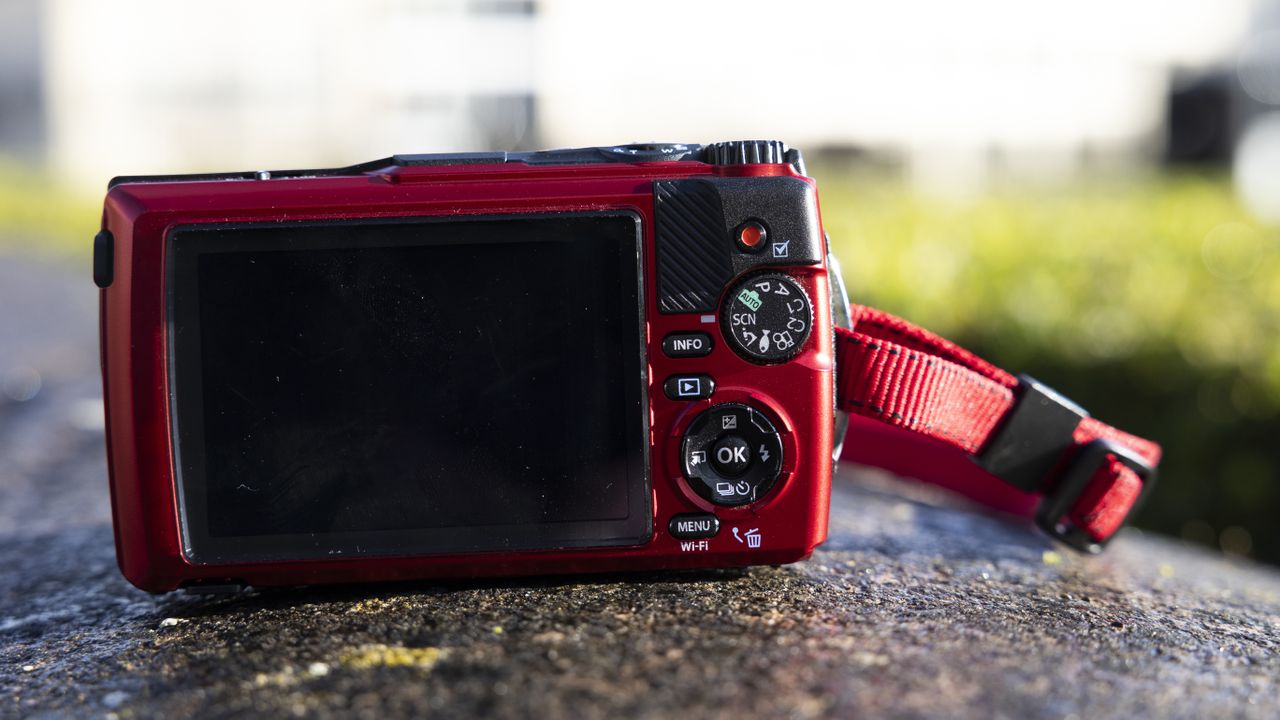 The rear view and buttons on the OM System Tough TG-7 camera