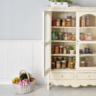 wooden pantry with glass storage jars