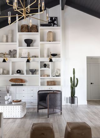 White living room with cubby shelving