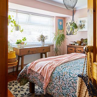 bedroom with slatted blinds