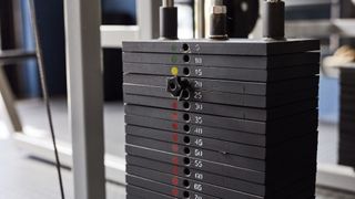 The weight section of a piece of gym equipment