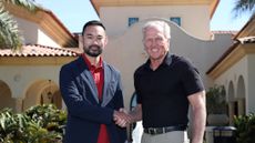 Greg Norman shakes hands with Asian Tour Commissioner 