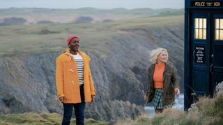 The Doctor and Ruby Sunday on a rocky moor with the TARDIS.