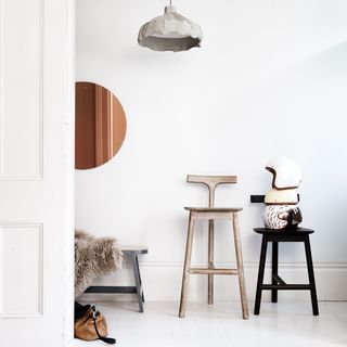 room with white coloured door stools and white wall