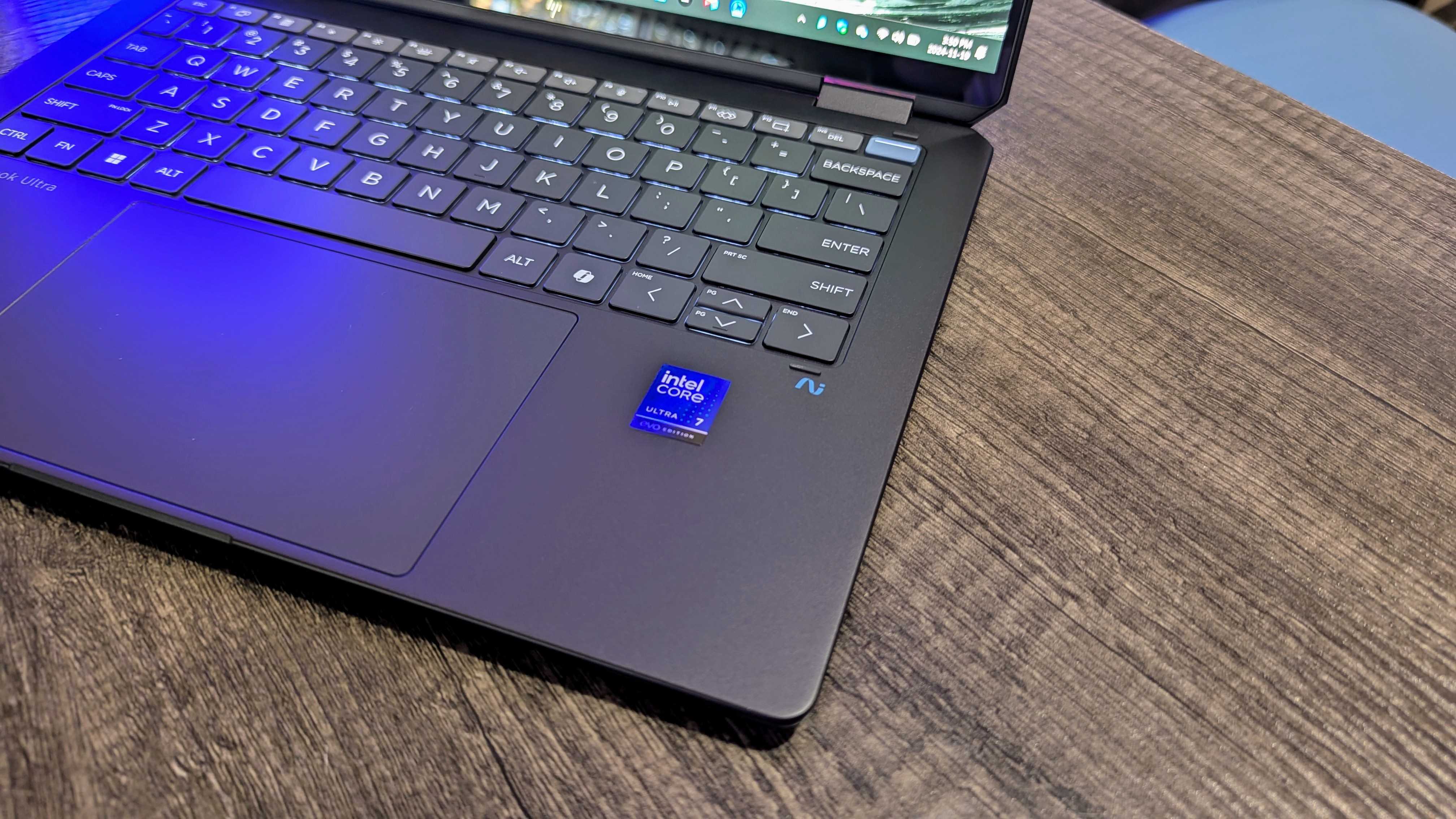 The HP OmniBook Ultra Flip 14 (2024) on a desk, showing the Intel Core Ultra sticker on the keyboard deck.