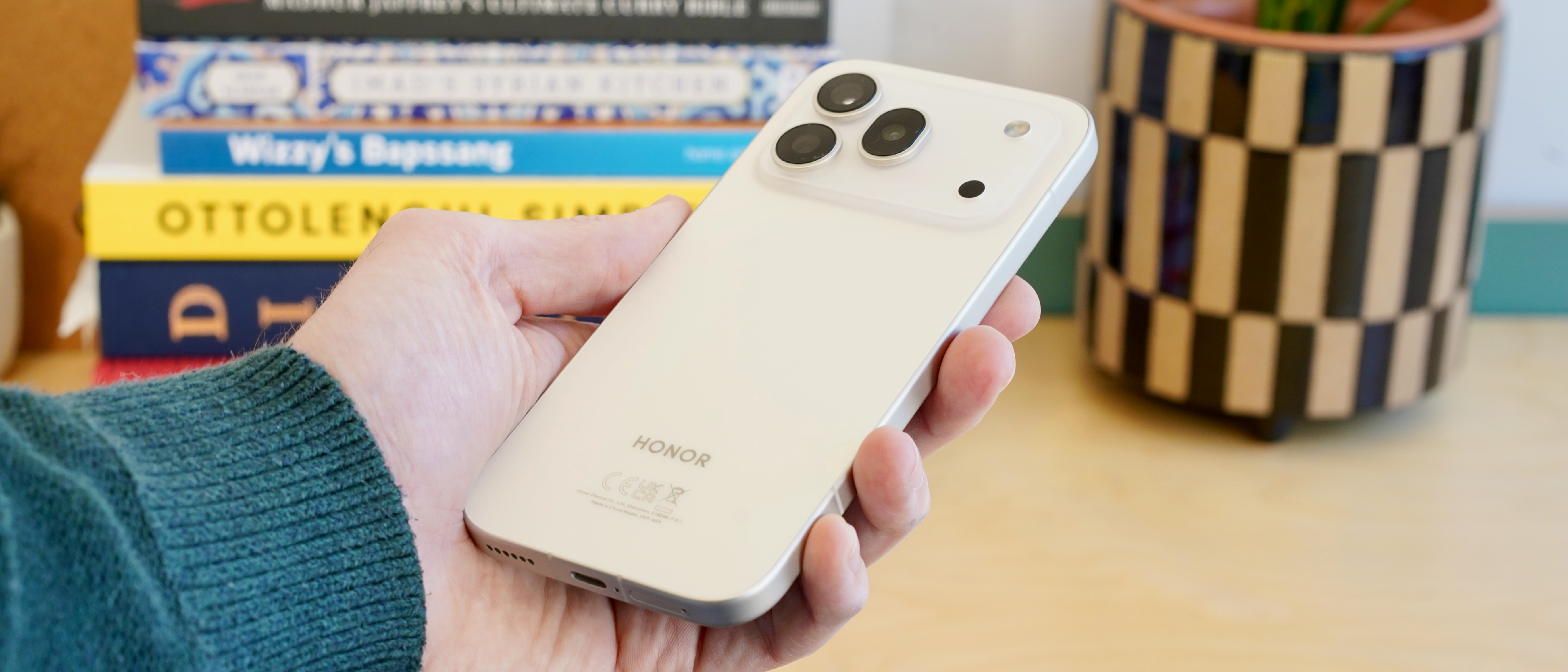 The Honor 600 Pro being held in the hand