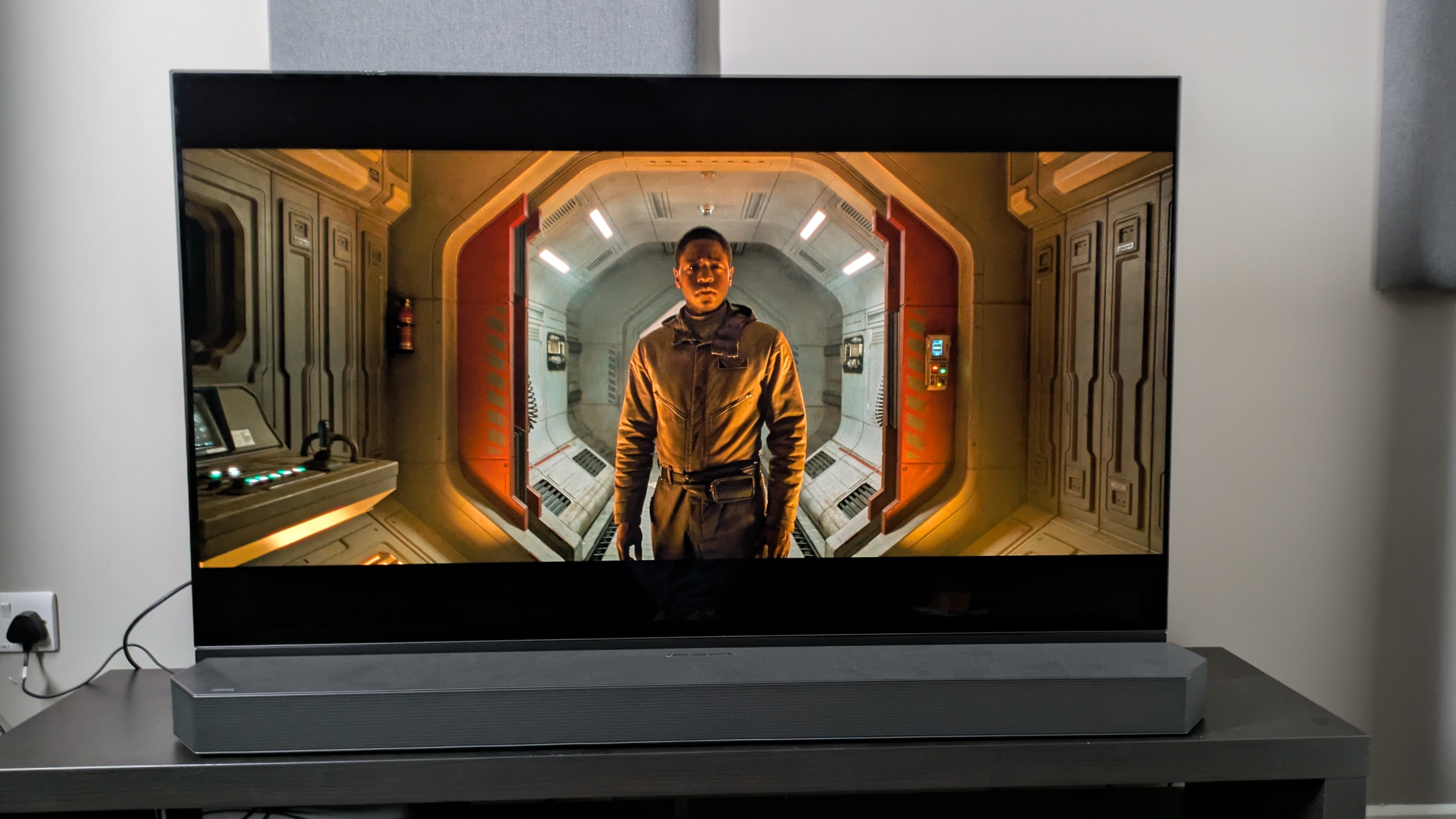 Alien: Andy's Romulus image on Panasonic MZ1500 OLED with HW-Q990C soundbar in front of the TV