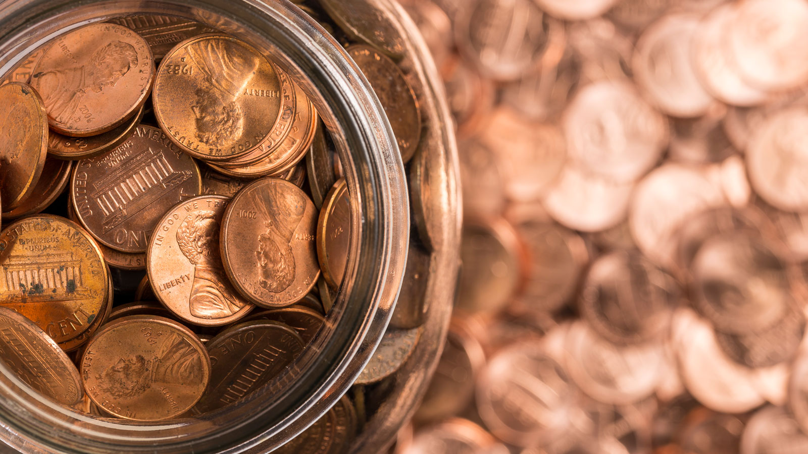 glass jar of copper pennies