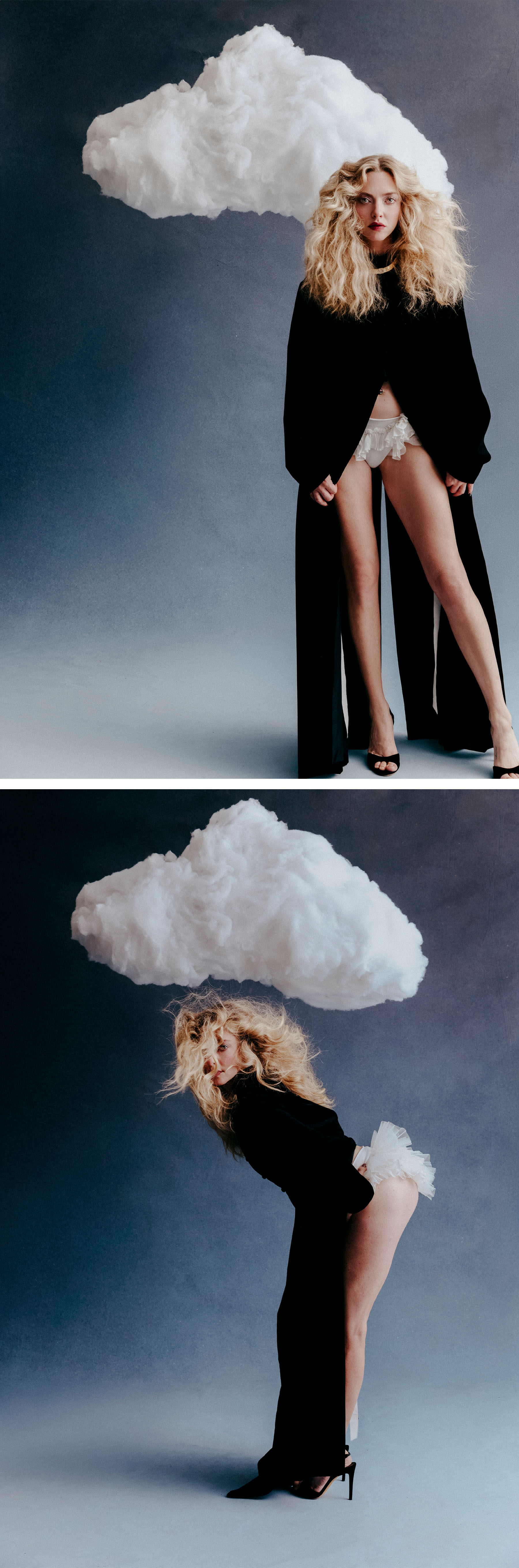 Amanda Seyfried for Who What Wear&#039;s December cover story. Seyfried is photographed standing in front of a hanging cloud. She is wearing a floor-length black coat that is opened up to reveal a pair of white briefs with lace ruffles.