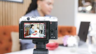 Fujifilm X-M5 in a meeting room recording video with its vertical 9:16 mode