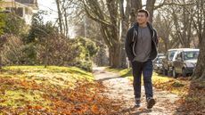 Man walking outdoors in autumn