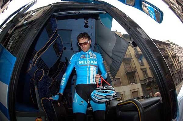 Alessandro Petacchi (Milram) exits the team bus before the start