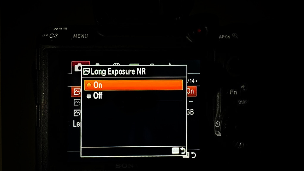 Close-up of a Sony camera screen displaying the "Long Exposure NR" settings with "On" selected in orange