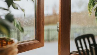 picture of wooden window slightly ajar