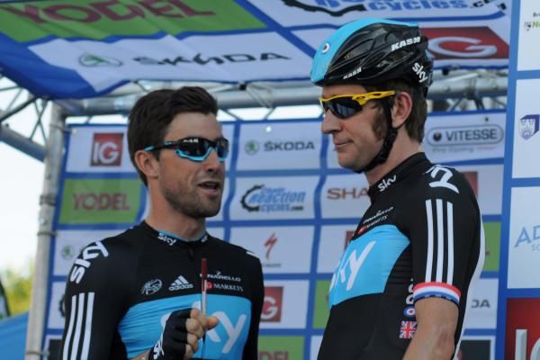 Eisel hands over the pen to Wiggins at sign on