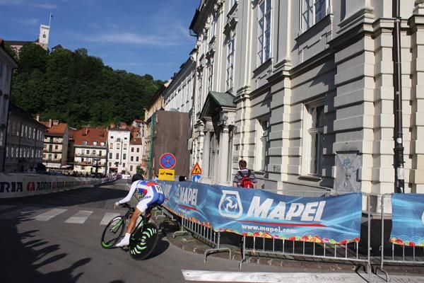 A racer zips around a corner
