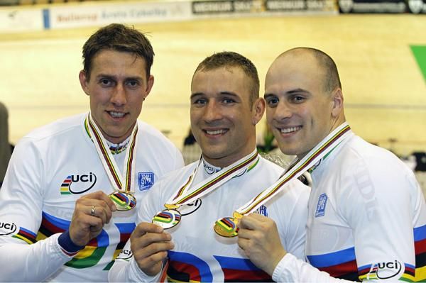 Germany's team sprint squad shows off their gold medals.