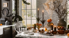an assortment of Halloween decor in a kitchen 