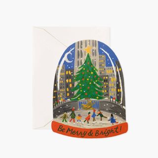 Merry and bright chirstmas card, ice skating scene in new york, snow globe style