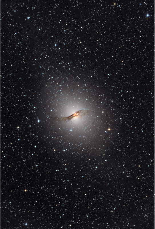 The elliptical galaxy NGC 5128, host of the Centaurus A radio source, as it appears in visible light. The galaxy is located about 12 million light-years away and is one of the closest that sports an active supermassive black hole