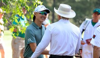 Min Woo Lee and Greg Norman at Augusta National